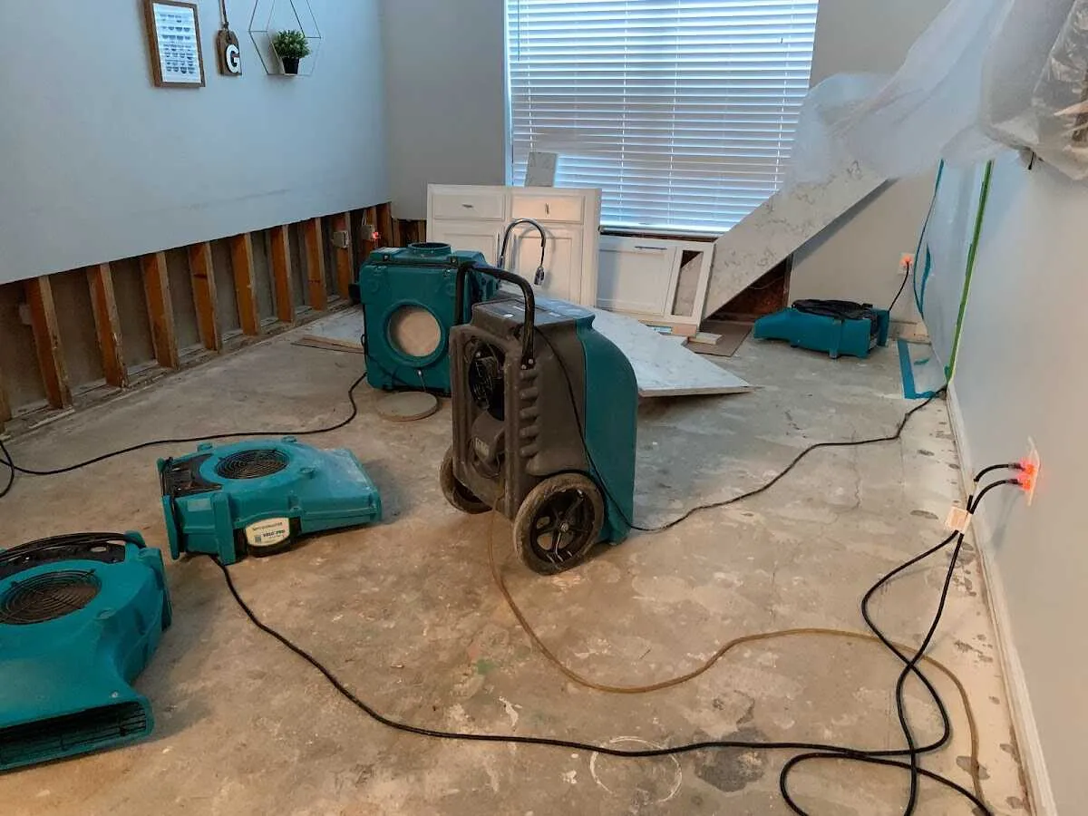 Dehumidifier in flood-cut room for Water Damage Restoration in Georgetown